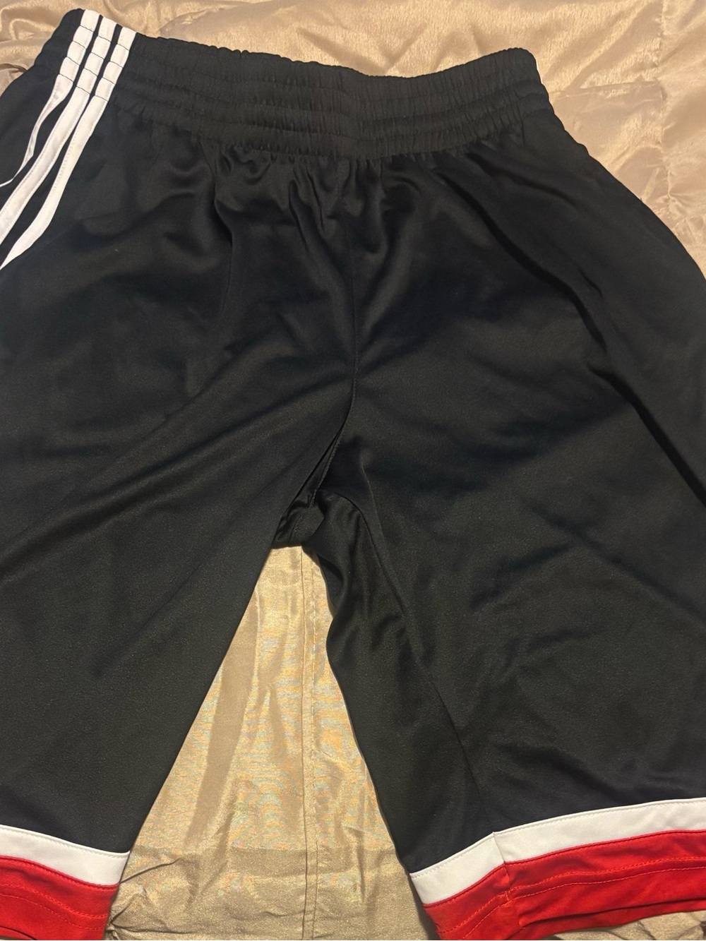 adidas Black Athletic Shorts with White Stripes and Red Hem